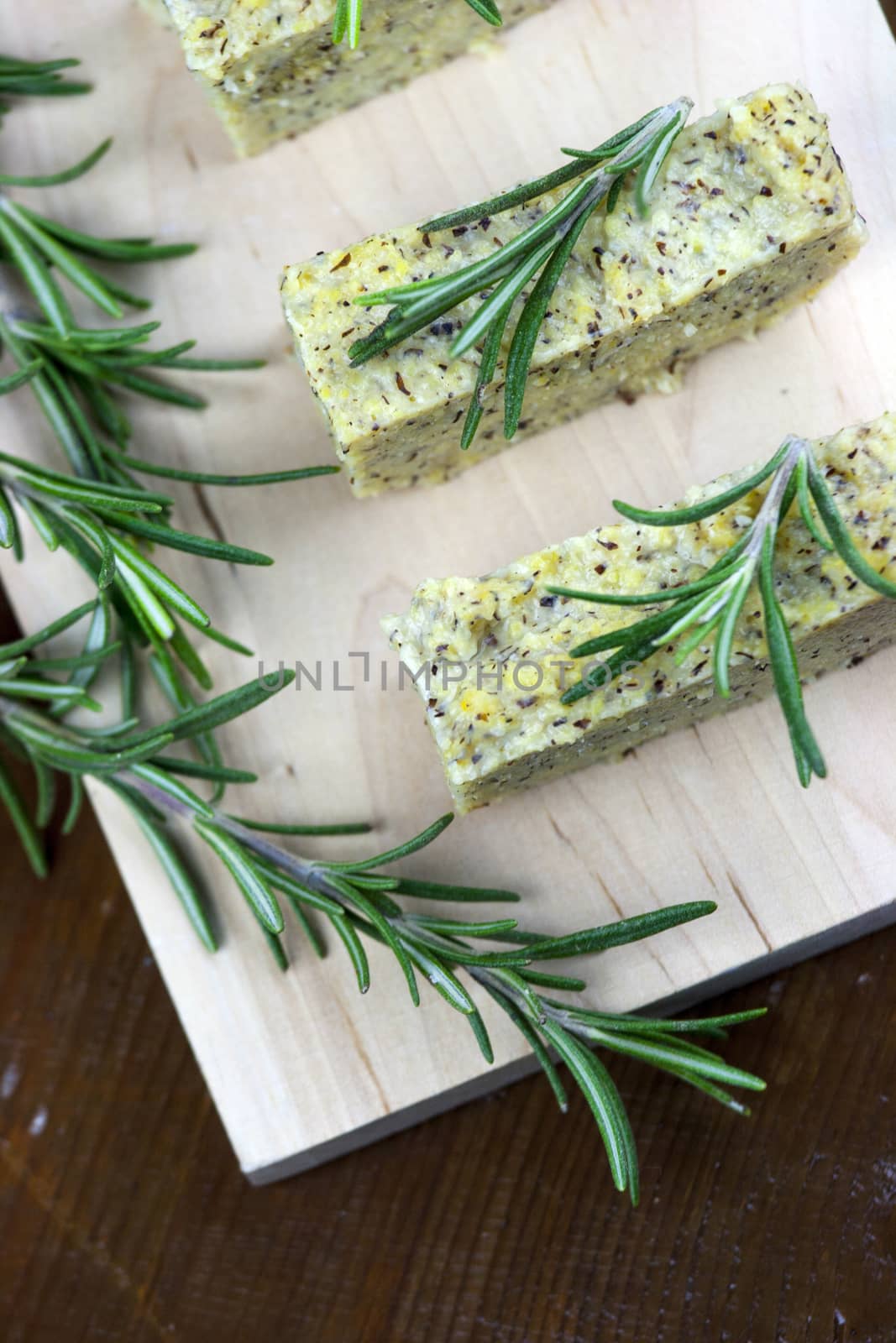 Baked polenta with italian cheese and rosemary by stefanoventuri