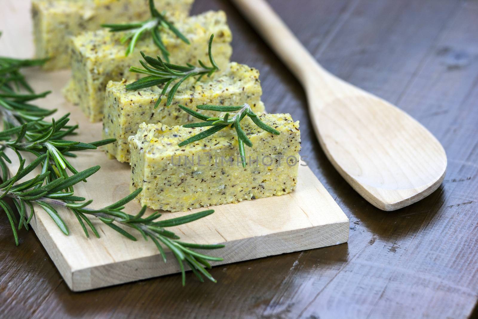 Baked polenta with italian cheese and rosemary by stefanoventuri