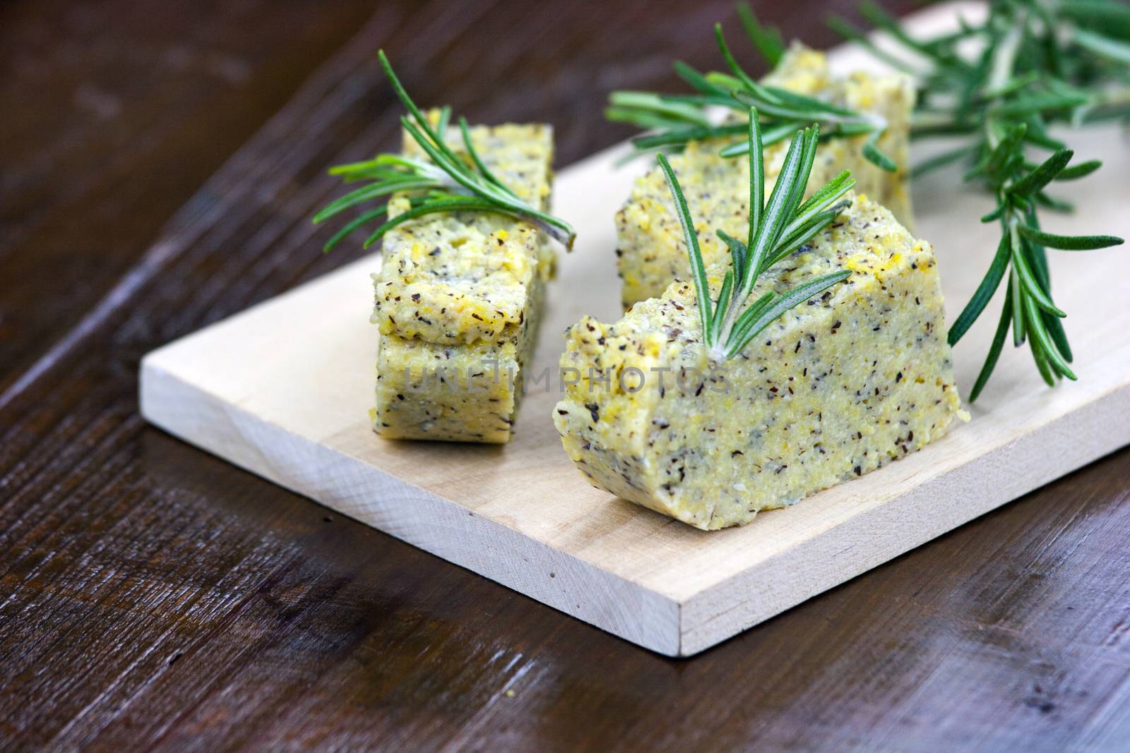 Baked polenta with italian cheese and rosemary by stefanoventuri