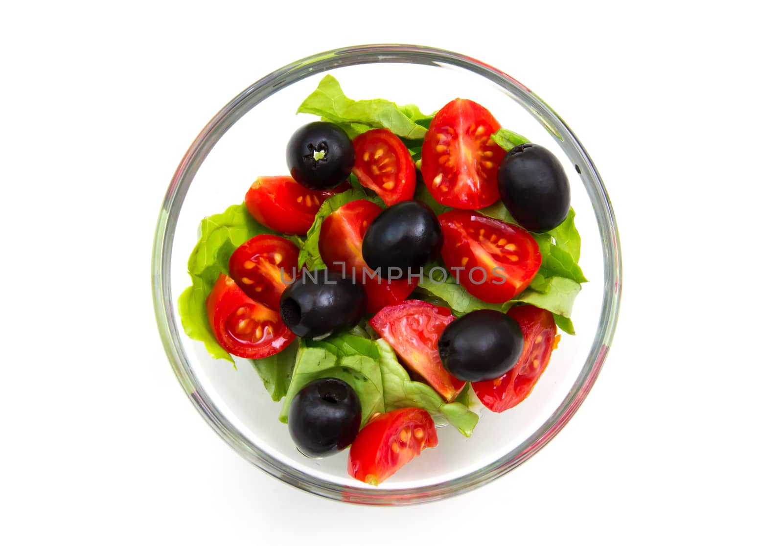 Fresh salad from above on white background
