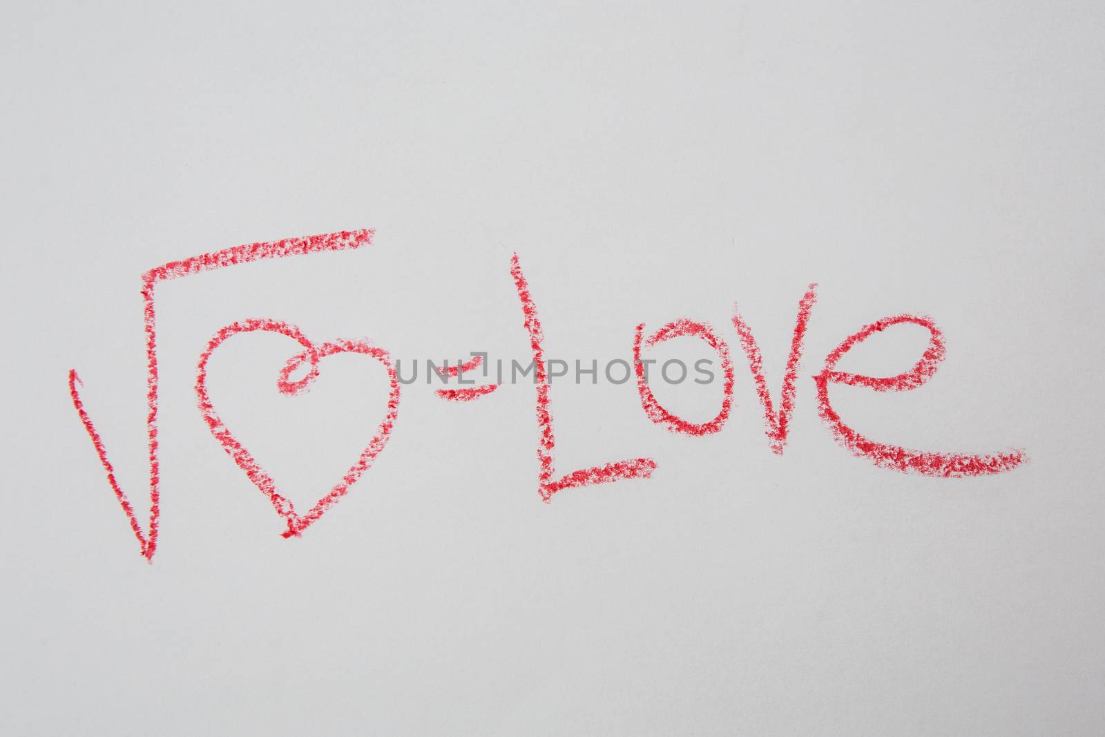 Square root of heart on white paper. Handwritten love formula.  by sarymsakov