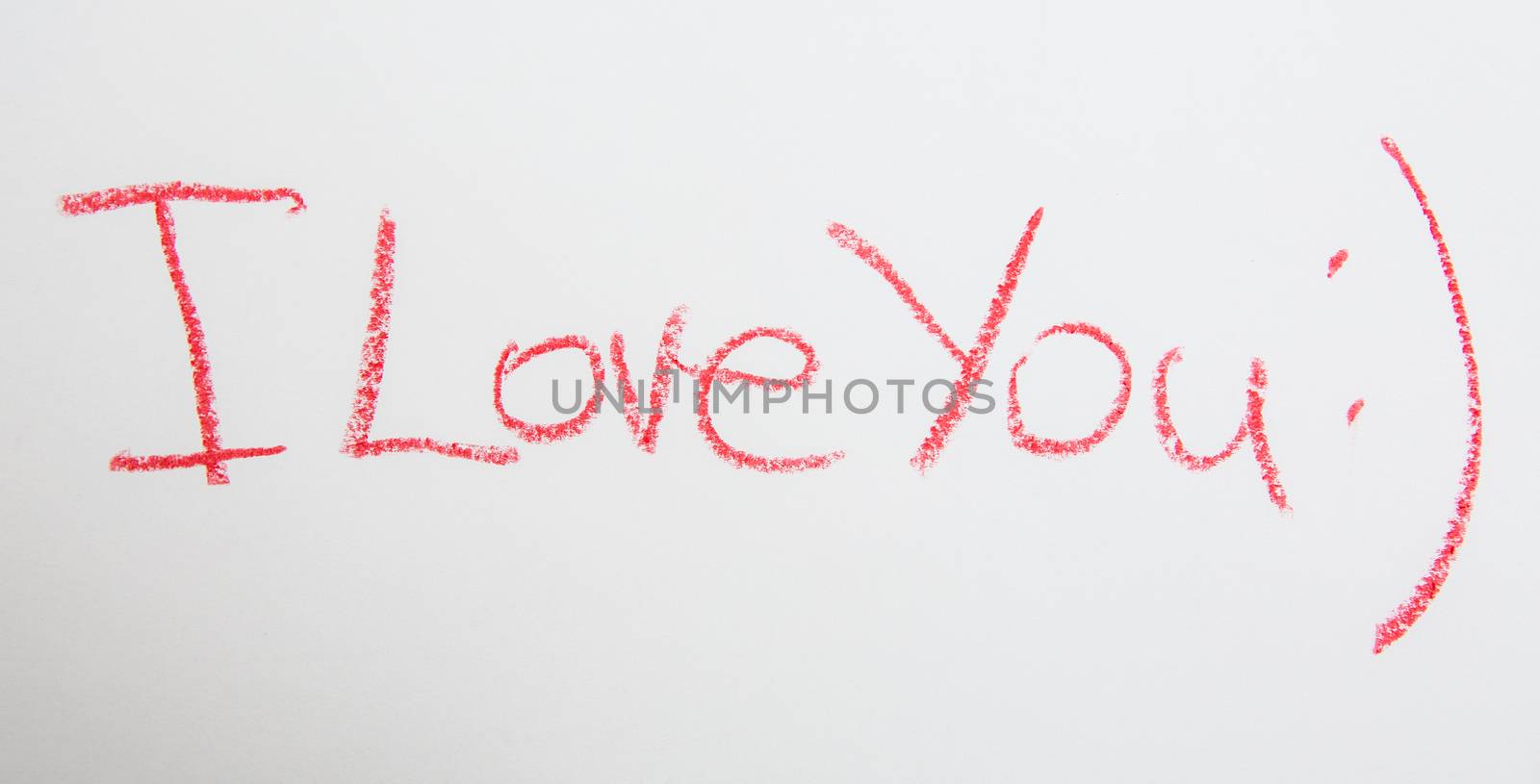 Handwritten simple words. I love You. On white paper. Creative card