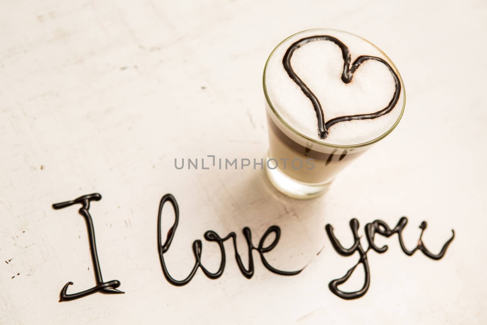 Love coffee cup and handwriting. I love you. Creative card