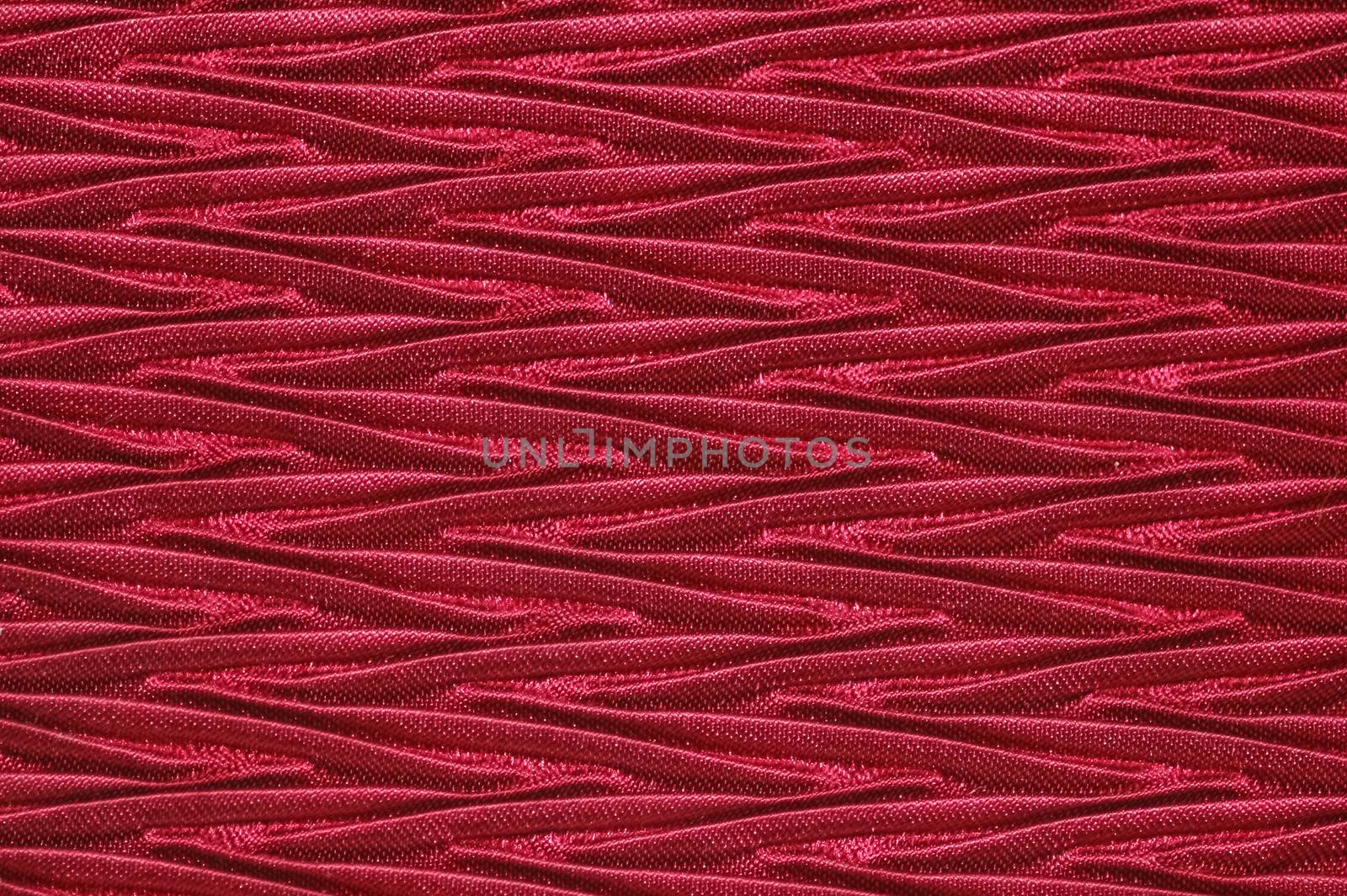 deep red textured fabric close-up