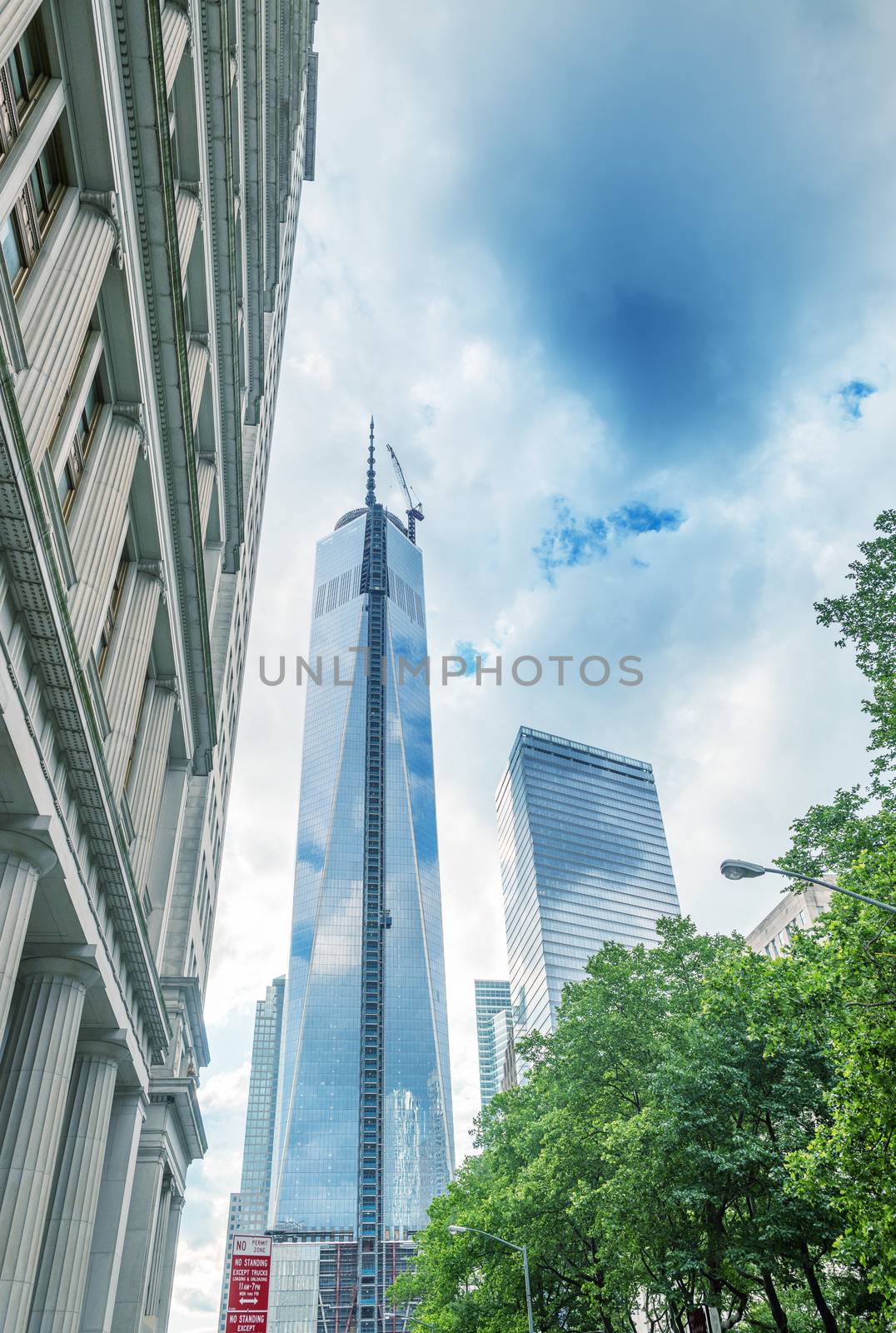 NEW YORK - JUNE 11: Lower mahattan and One World Trade Center or Freedom Tower on June 11, 2013 in New York City, The Tower is the primary building of the new World Trade Center complex.