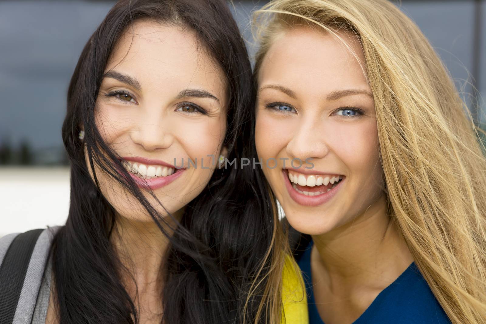 Portrait of a beautiful two young girls smiling