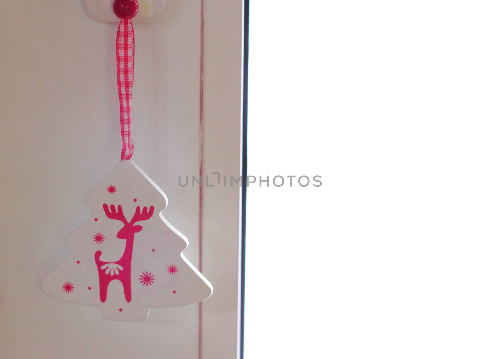 Toy Christmas Tree with a deer. Wooden, red and white colors