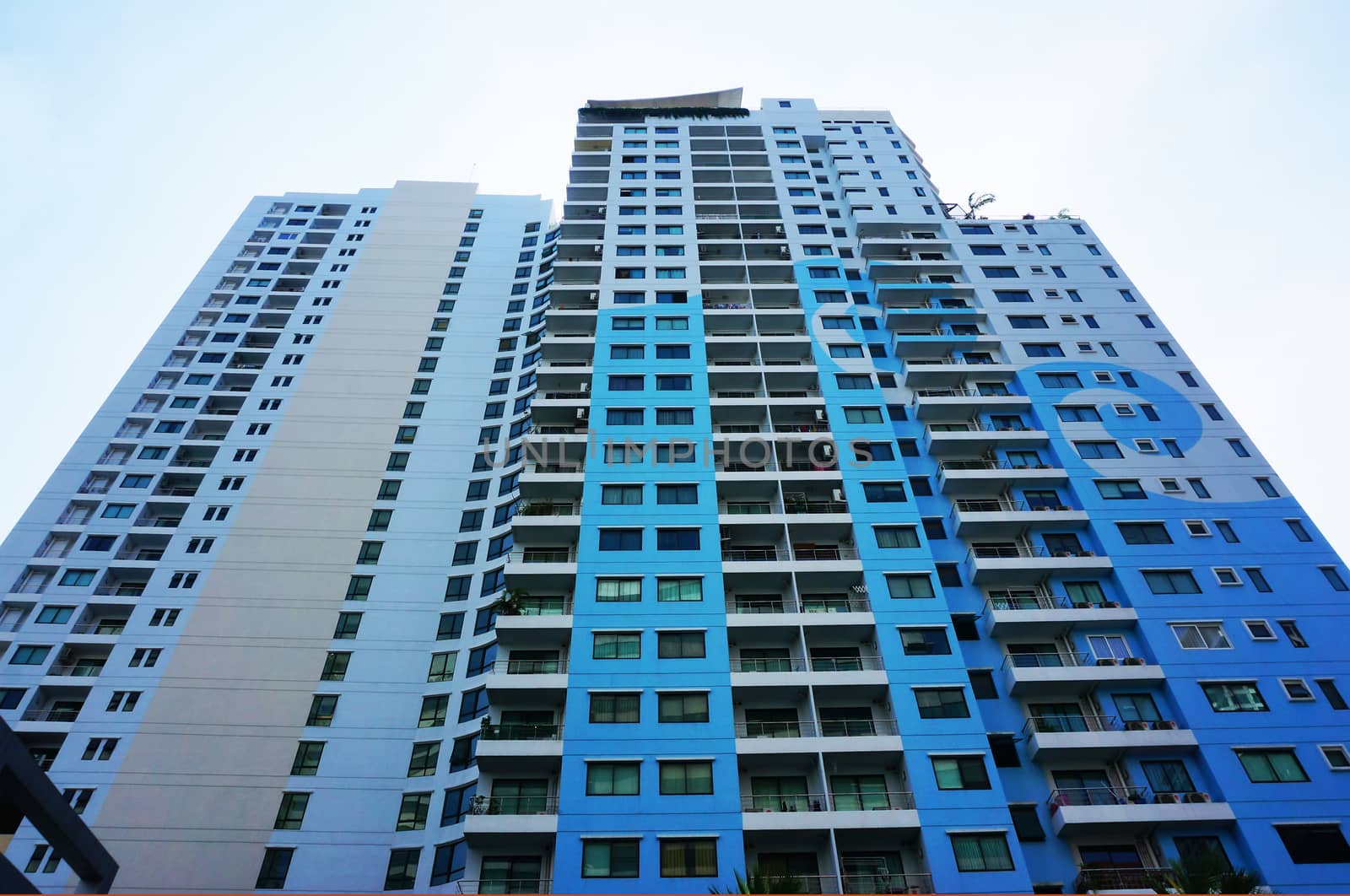 High-rise building with cement painted blue color in the capital.                               