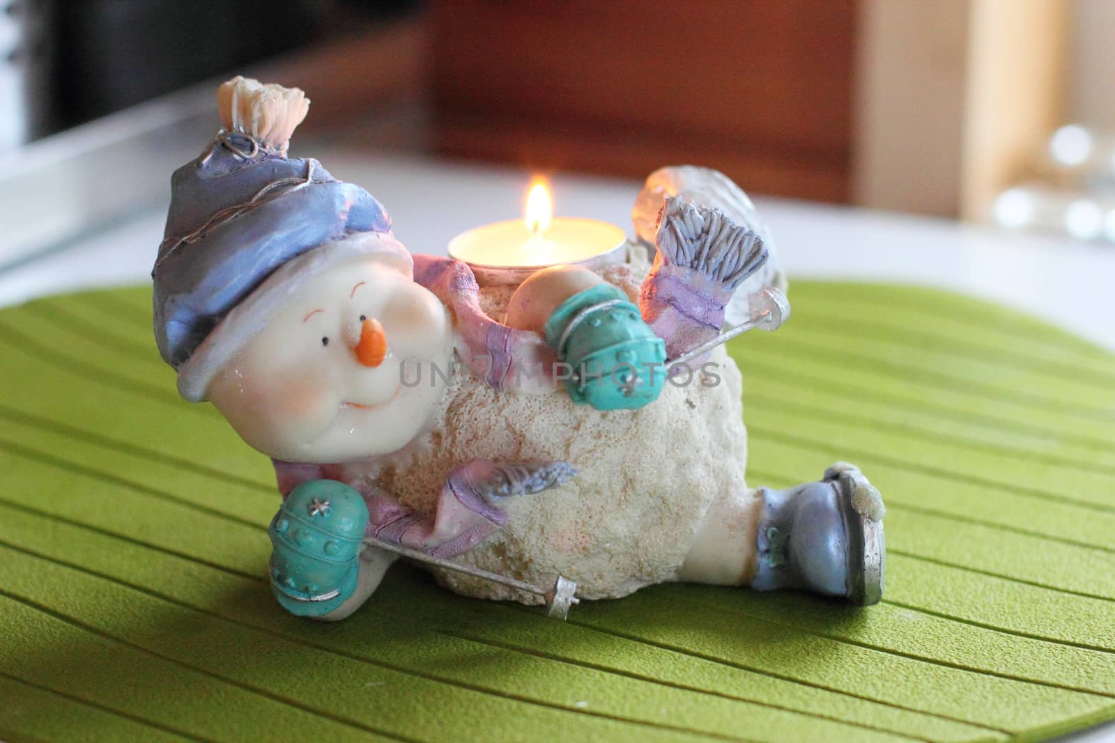 Cheerful snowman skier. Candlestick. by Metanna
