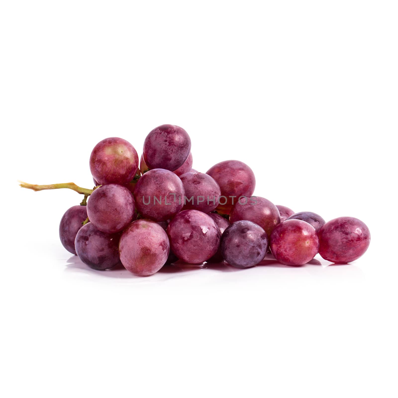 Red grapes on a white background