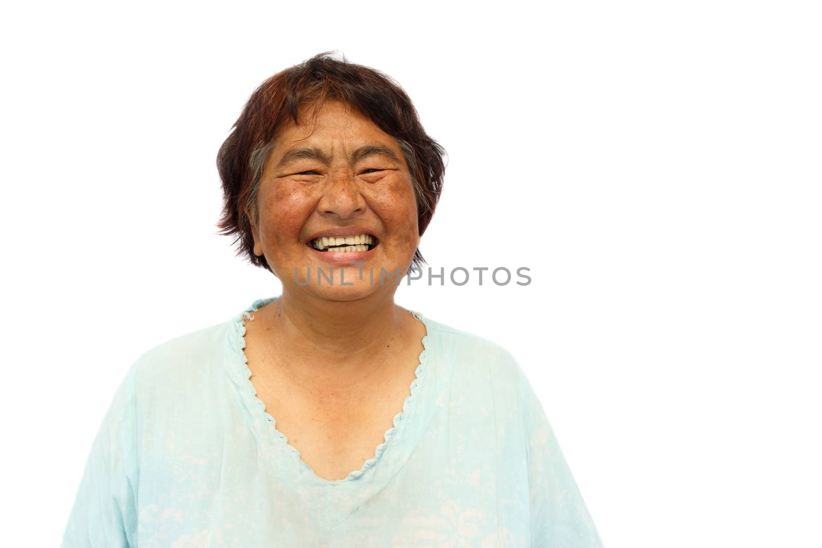 Old aged thai woman is smiling and blank area at right side