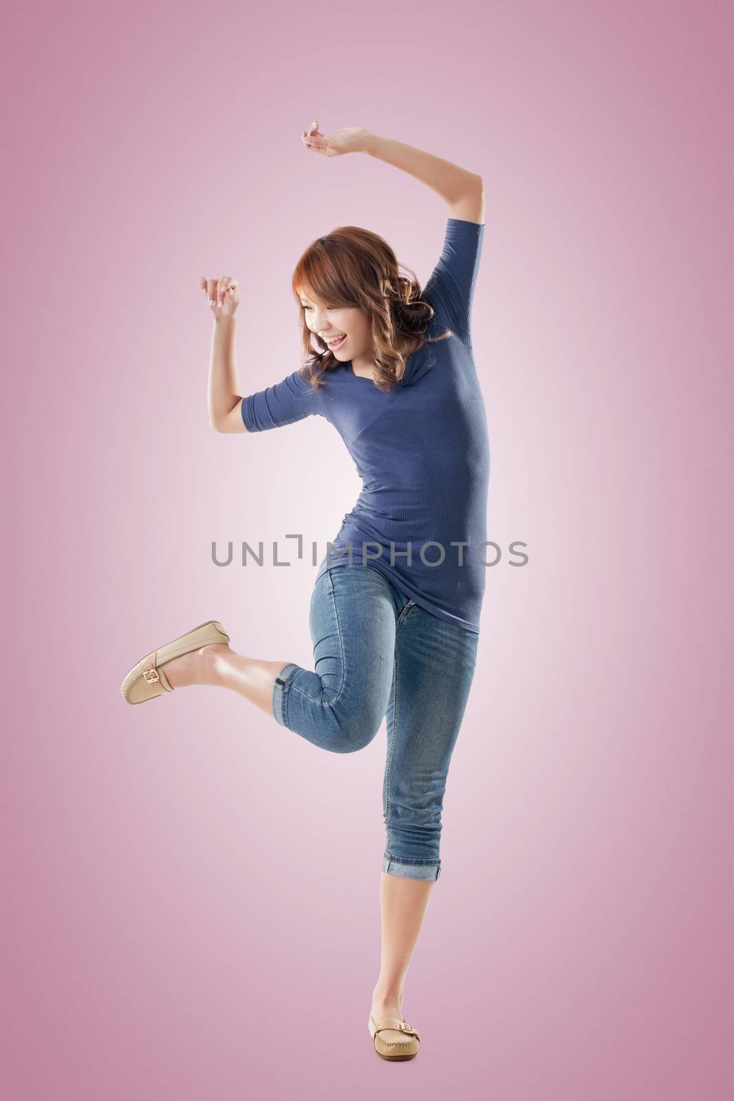 Excited Asian young girl, full length portrait isolated.