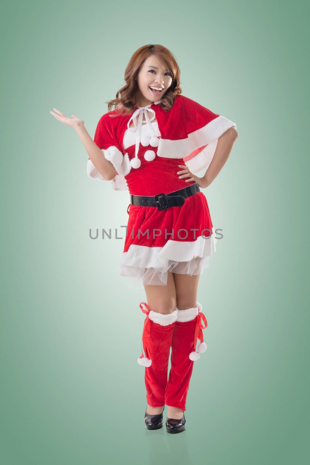 Smile happy Asian Christmas girl introduce, isolated full length portrait.