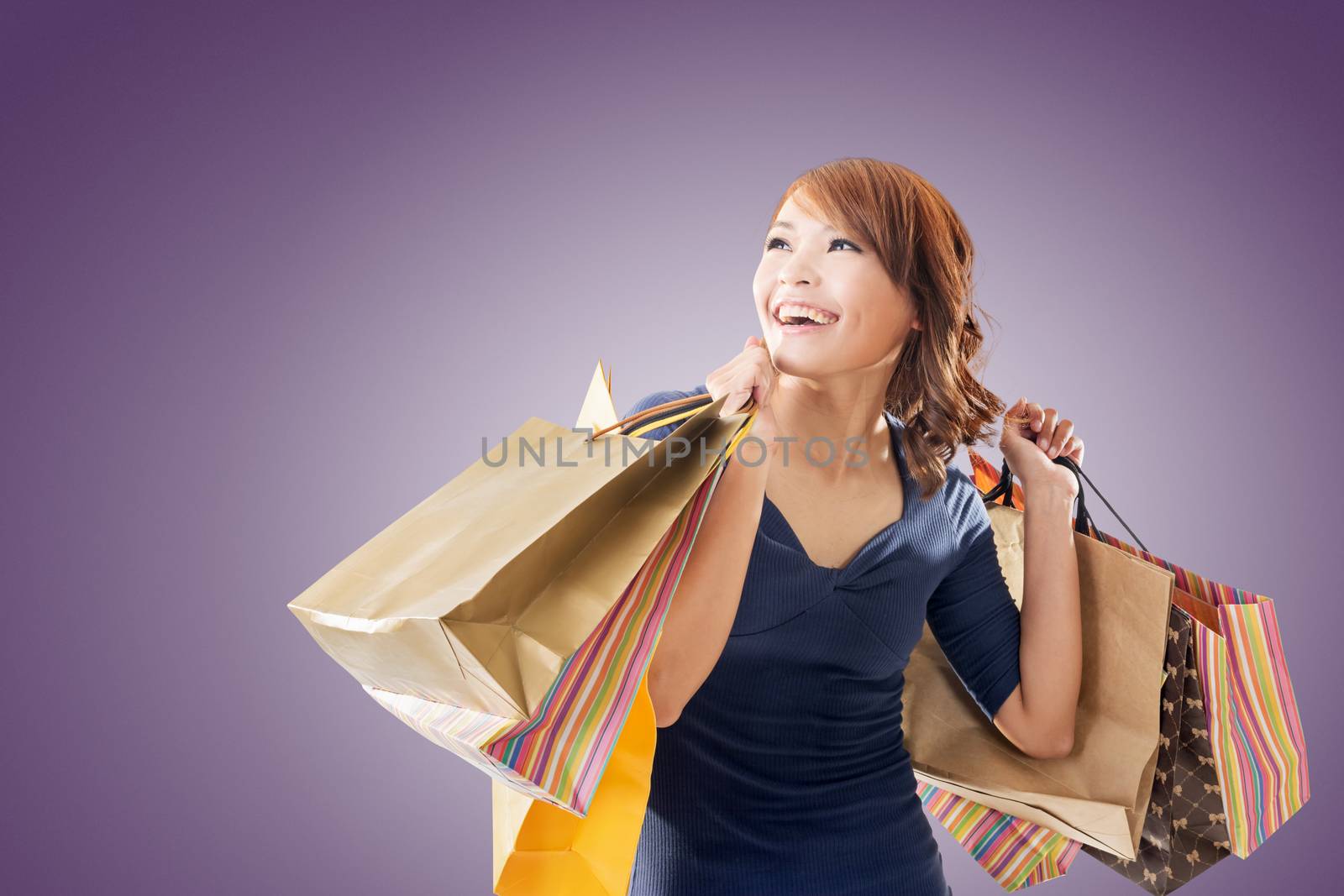 Cheerful shopping woman by elwynn