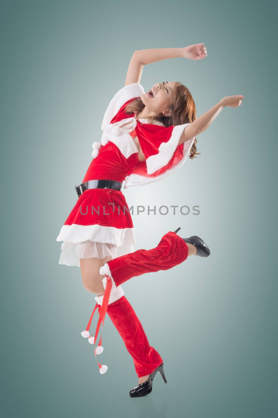 Attractive Christmas lady of Asian woman, full length portrait.