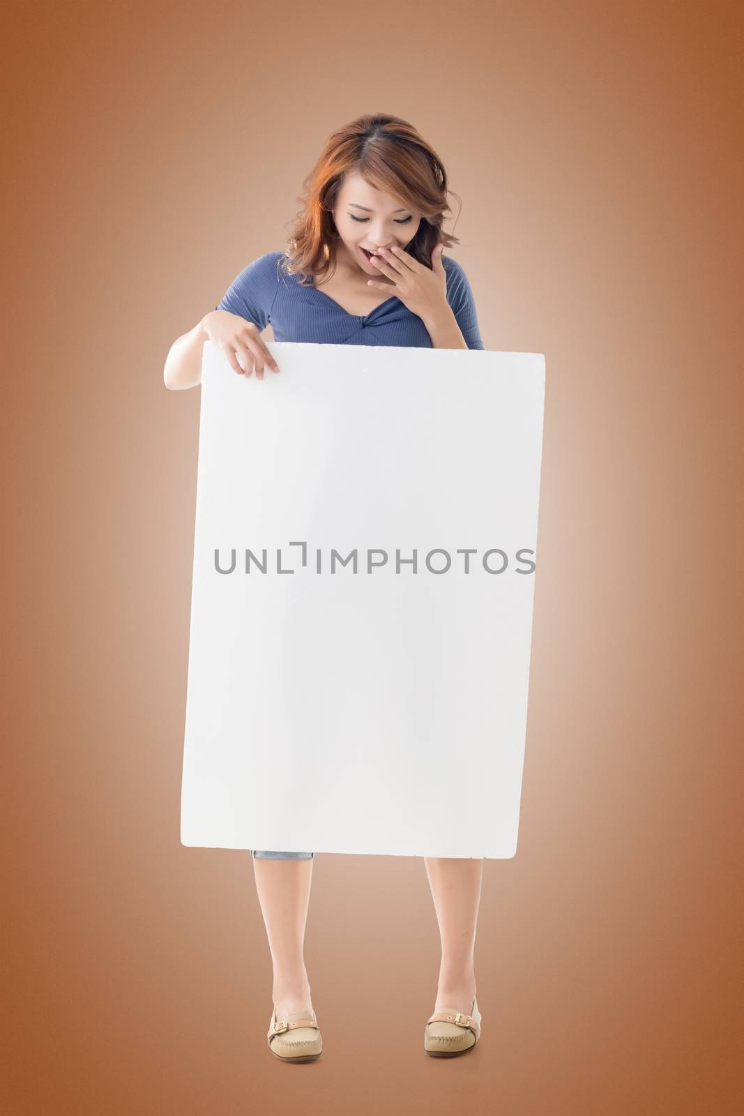 Excited Asian girl hold a blank board by elwynn