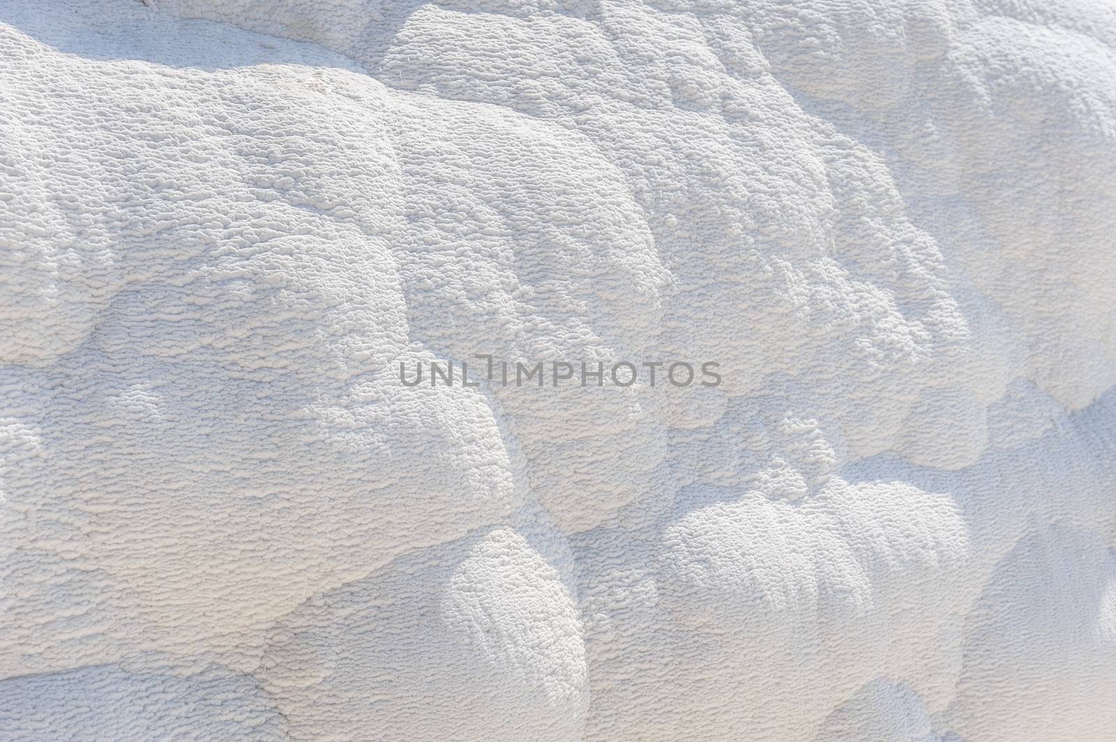 Natural travertine chalk deposits background, Pamukkale, Turkey