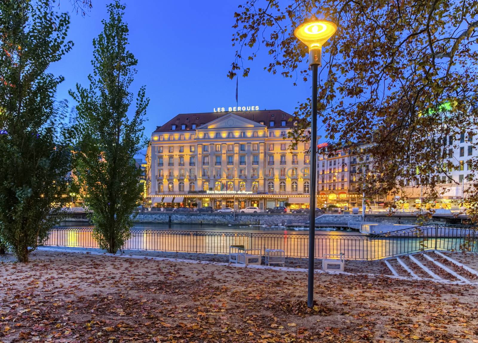 GENEVA, SWITZERLAND - November 13, 2014 : Bergues Hotel and riverside from Rousseau island, Geneva, Switzerland, HDR