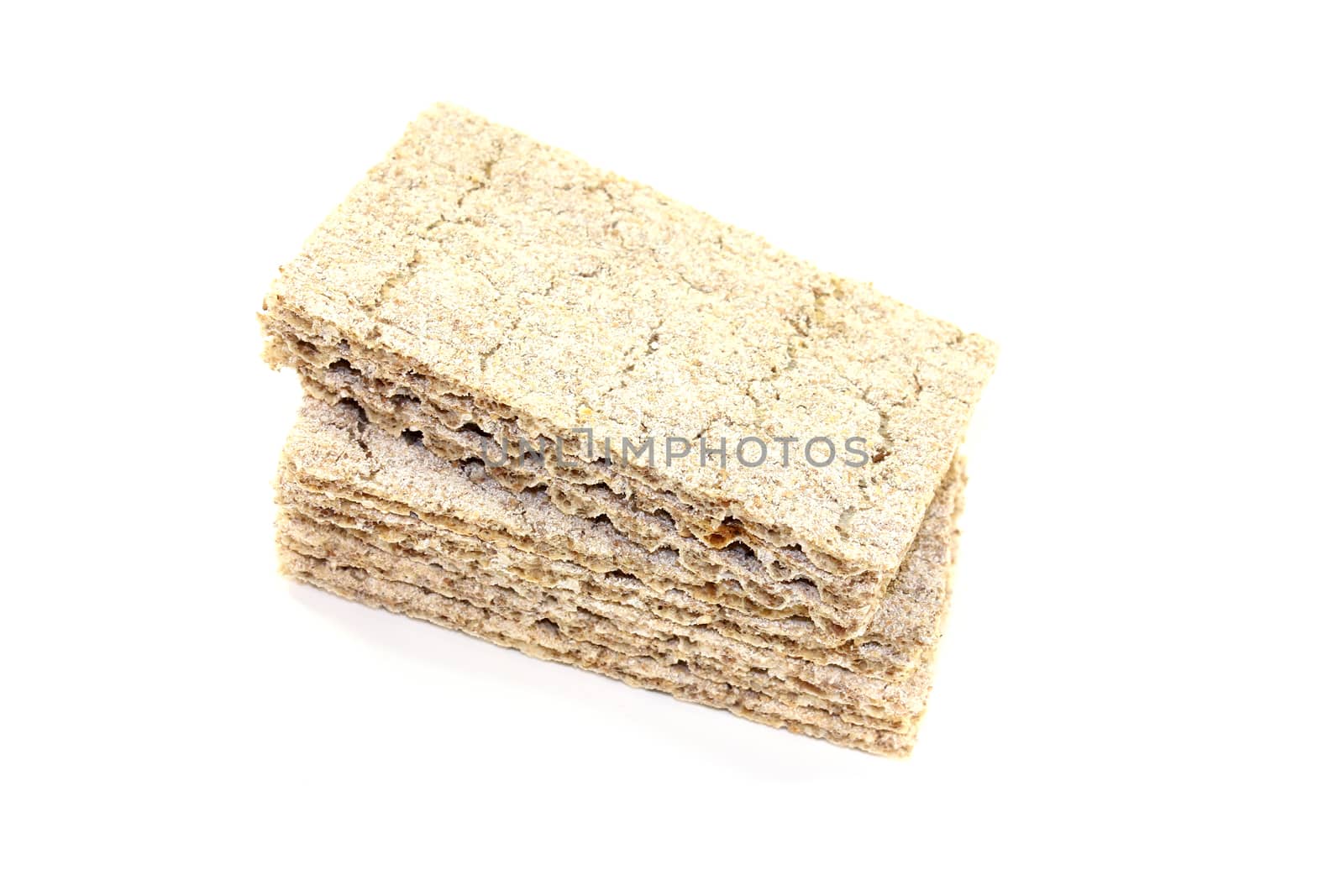 small stack of fresh crispbread on a light background