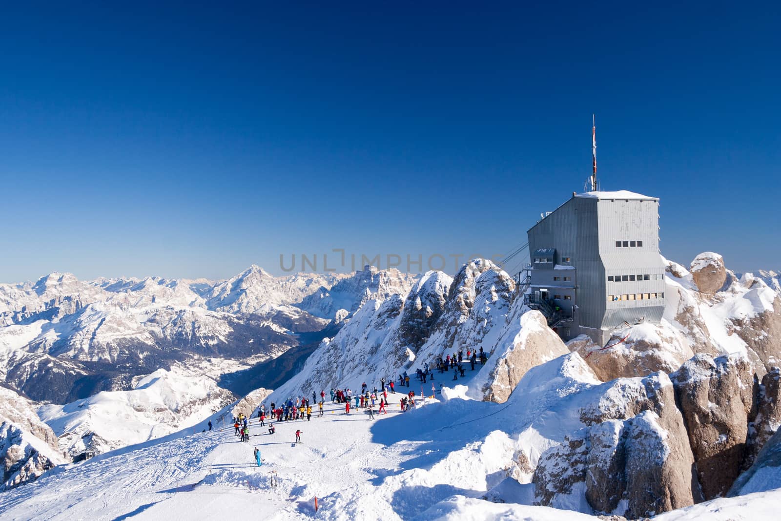 At the Marmolada glacier skiing slopes at sunny winter day by straannick