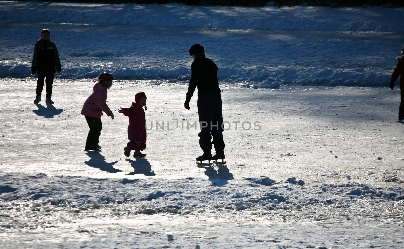 Skater on  a lake in denmark in winter
