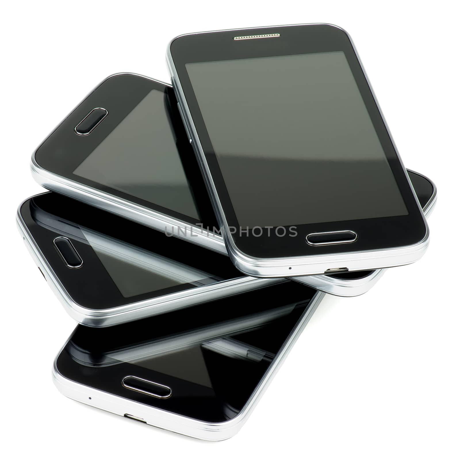 Arrangement of Four Contemporary Black and Silver Smartphones isolated on white background