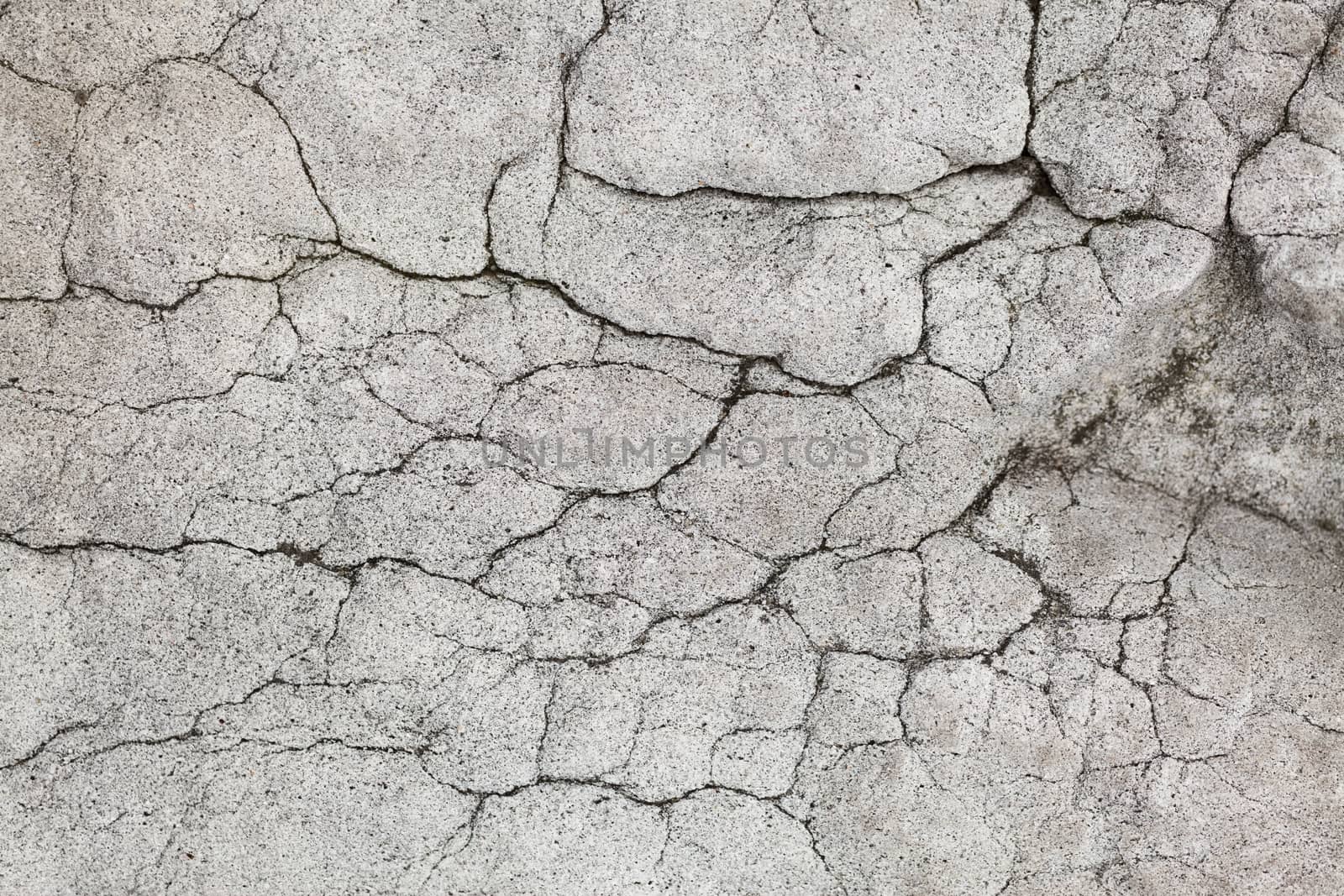 Image of a cracked stone surface