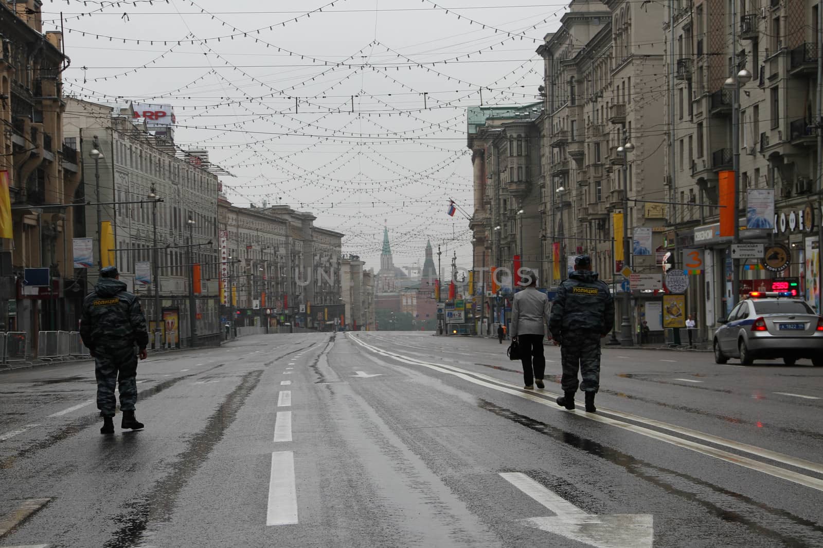 Moscow, Russia - May 9, 2012. March of communists on the Victory Day. Free road to the Kremlin and police officers. Before procession of communists