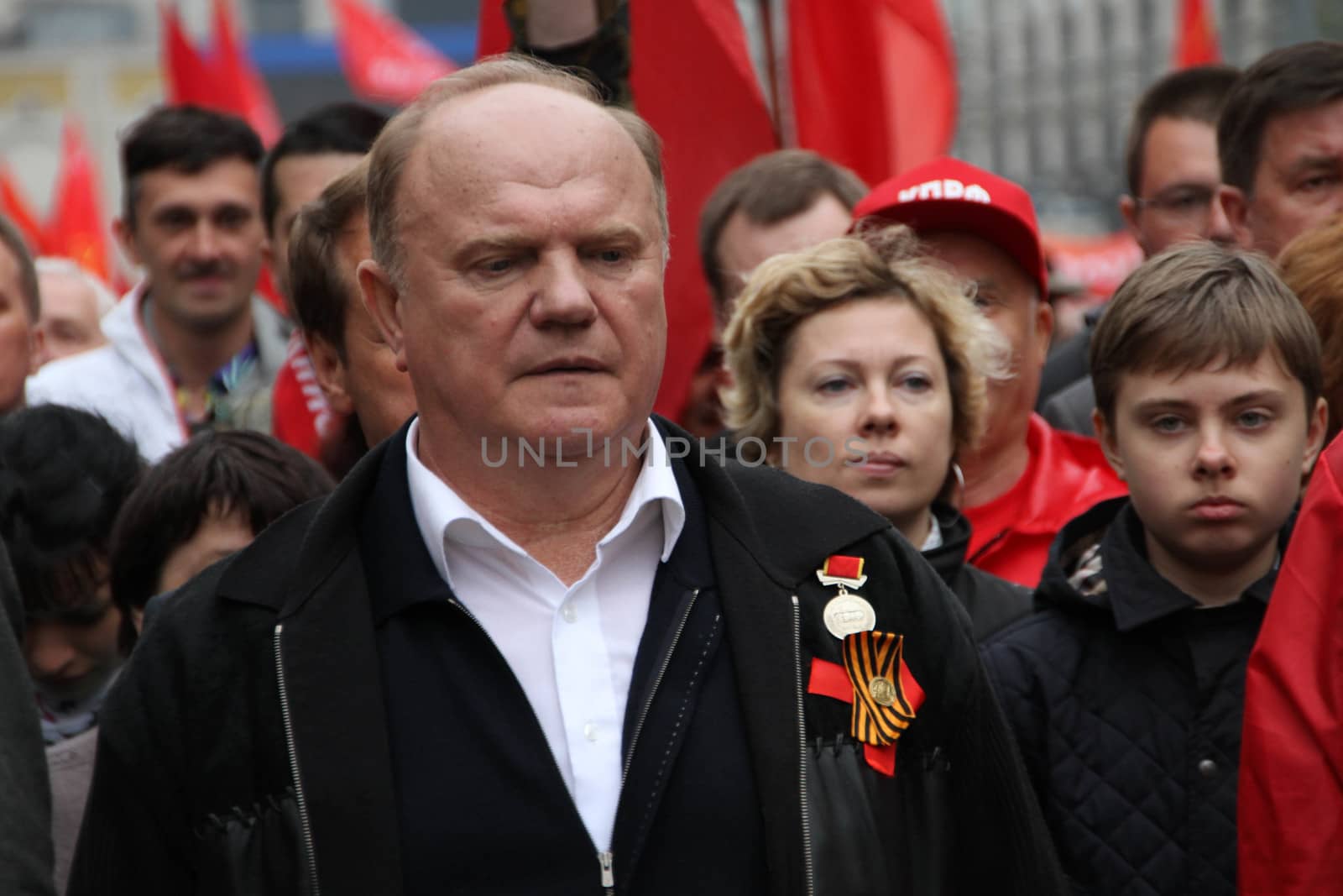 Moscow, Russia - May 9, 2012. March of communists on the Victory Day. Leader of communist party of Russia Gennady Zyuganov