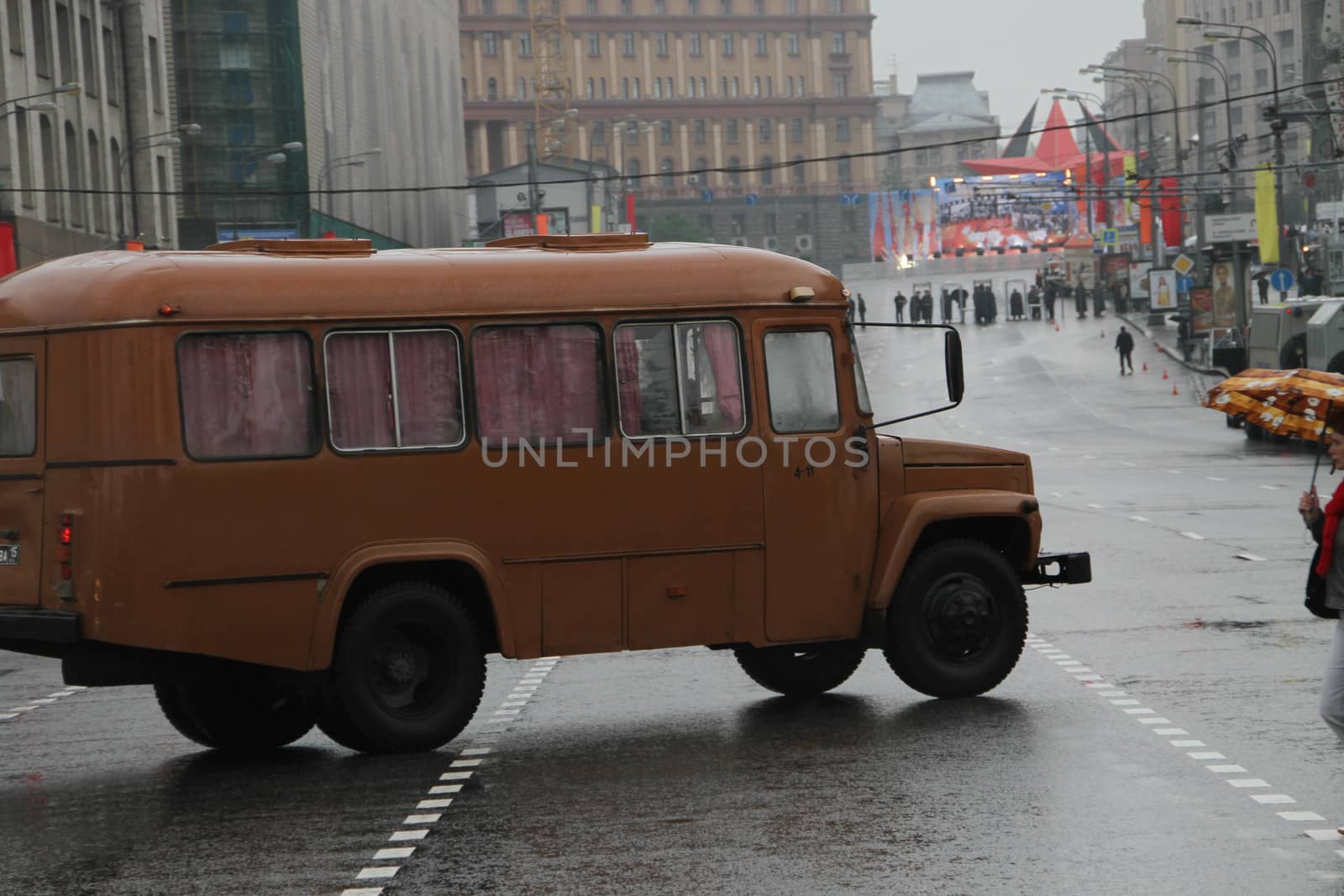 Moscow, Russia - May 9, 2012. March of communists on the Victory Day. Retro the bus on streets of Moscow in day of procession of communists