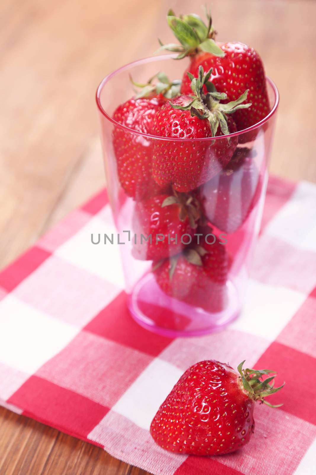 heap red ripe,fresh strawberry in plastic container