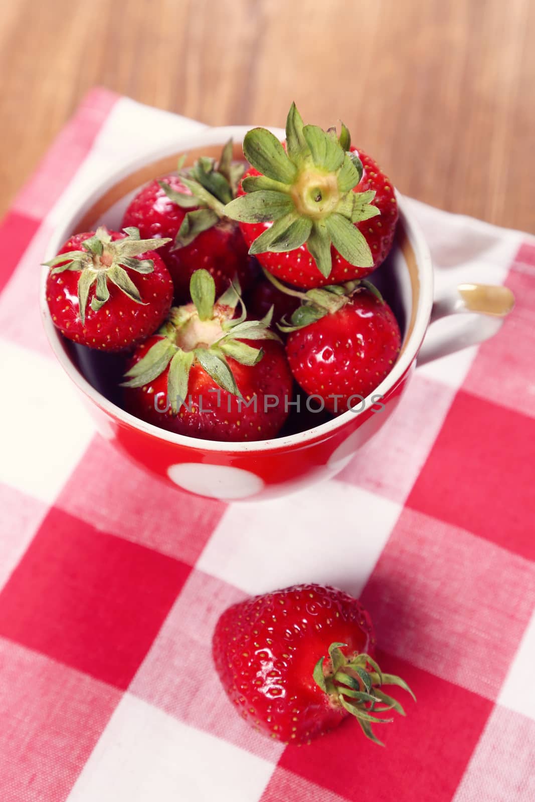 heap red ripe,fresh strawberry in ceramic cup