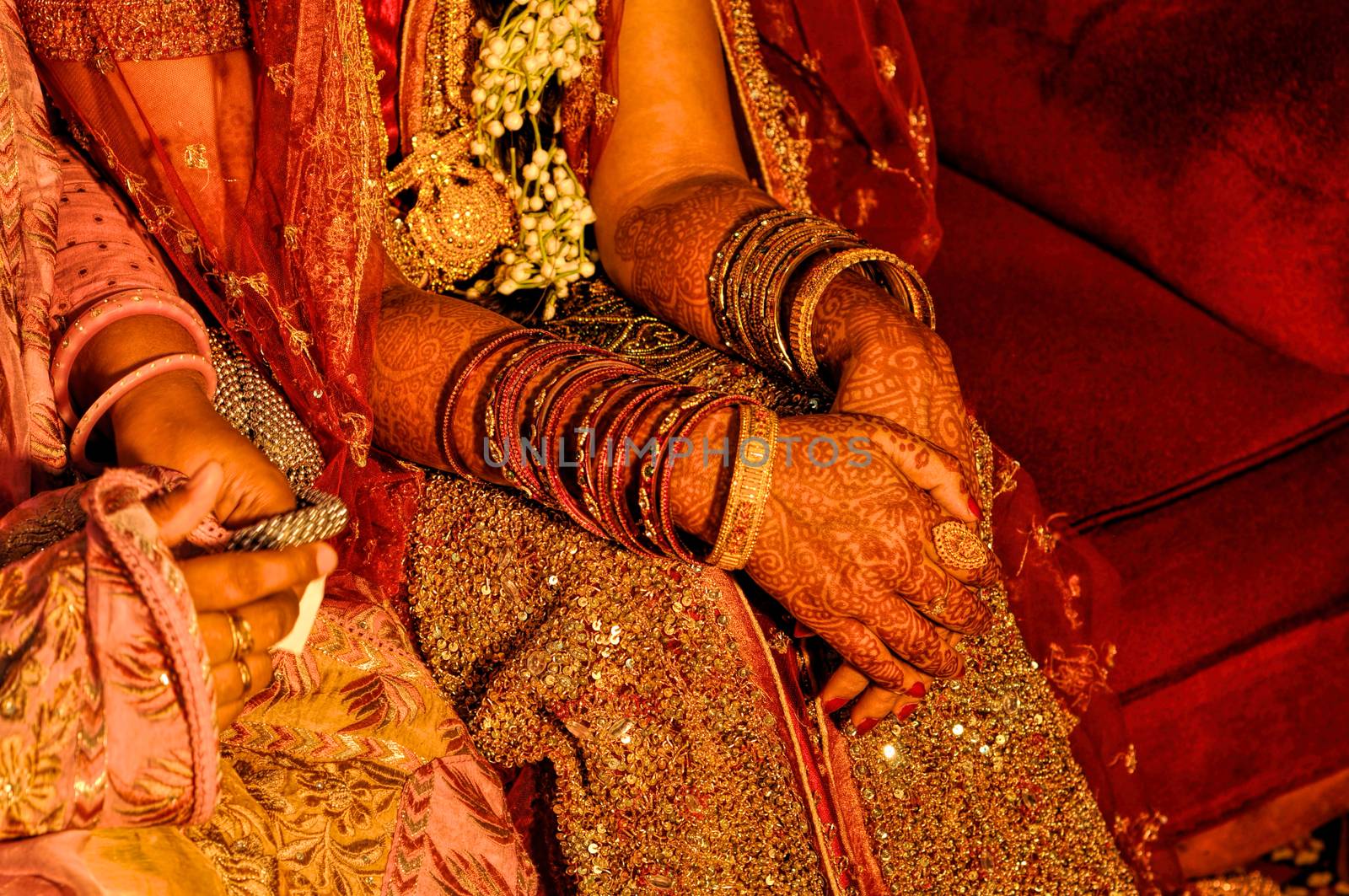 Traditional henna on brides hands on wedding in Bangladesh