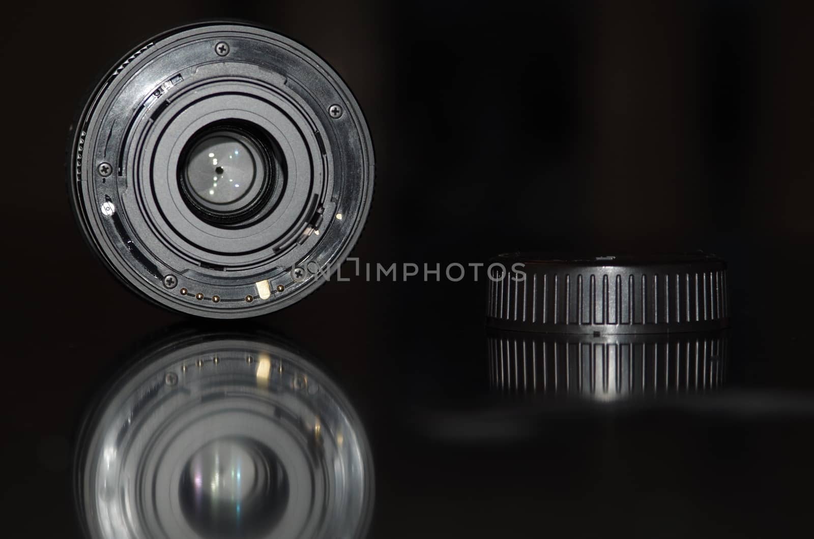 Backside of a camera lens showing optical eye.