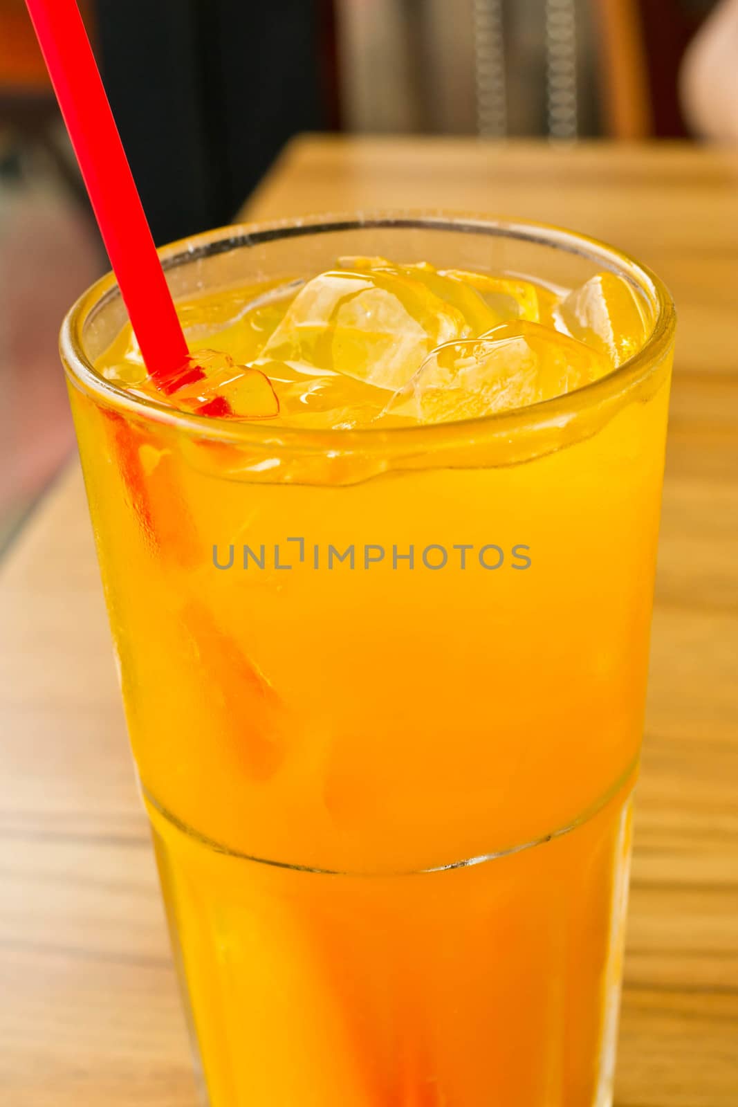 Orange juice with ice  in a glass place on the table 