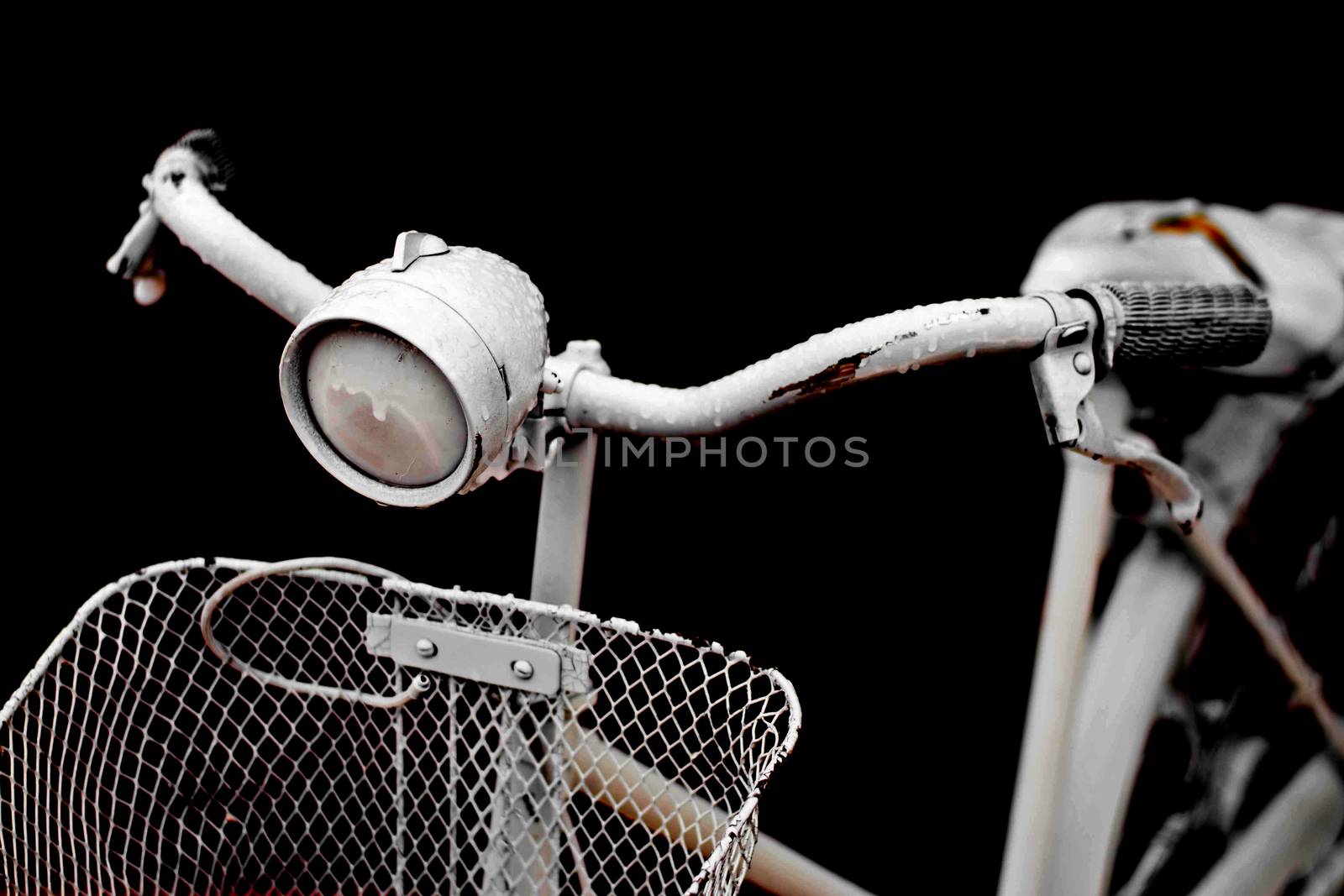 Old vintage bicycle in the village  by Thanamat