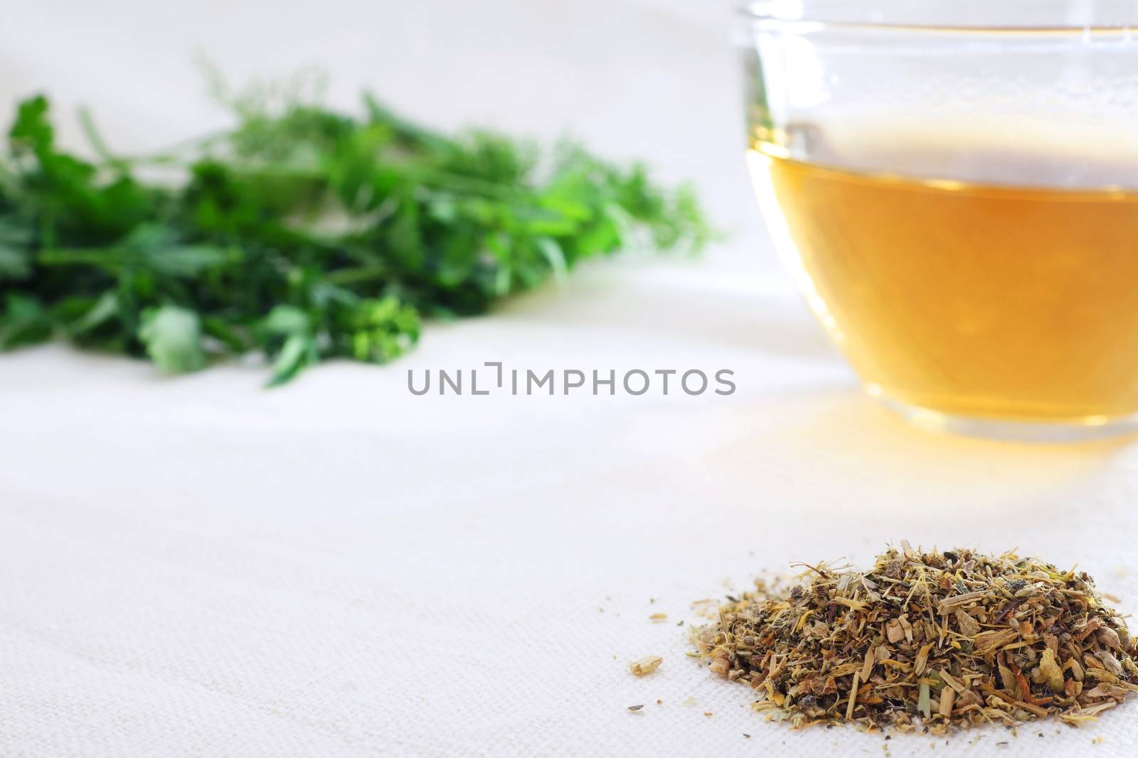 mixture of dried herbs with herbal tea and green herbal leaf by designer491