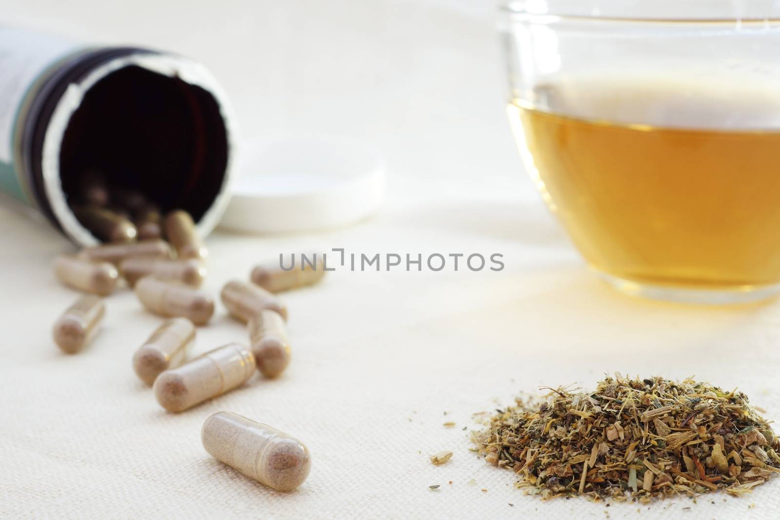 mixture of dried herbs with herbal tea and herbal pills