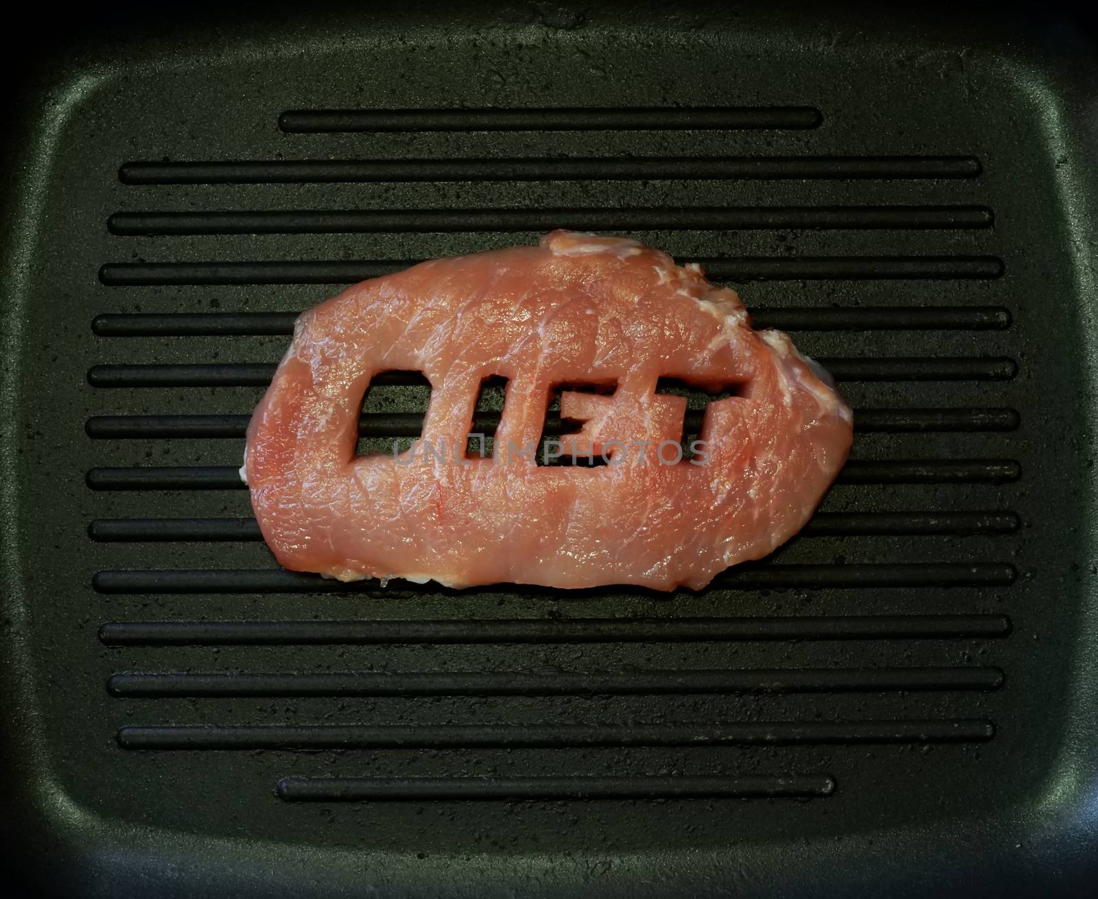 Fresh meat with a word diet in a pan. Protein diet.