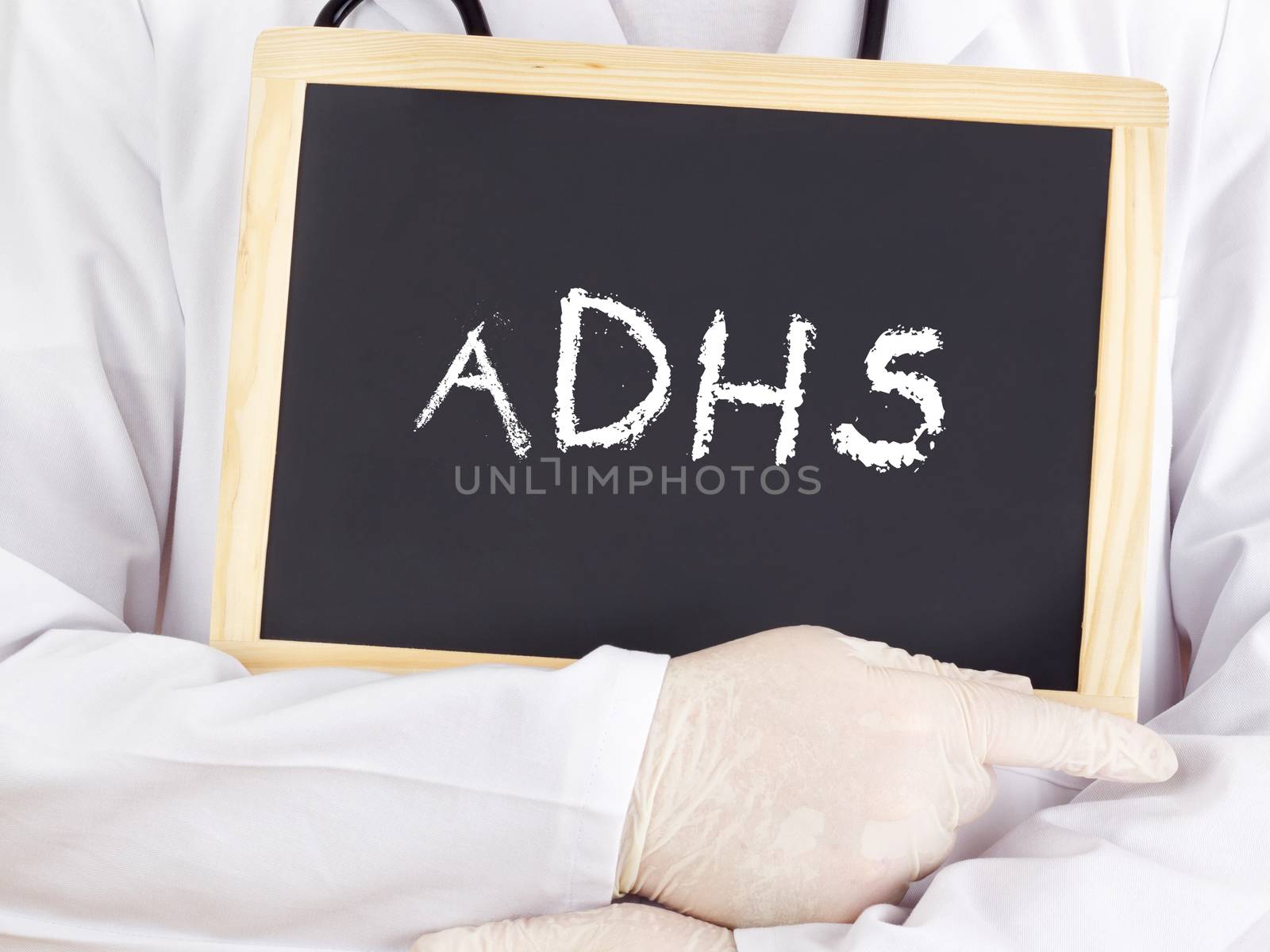 Doctor shows information on blackboard: adhs by gwolters