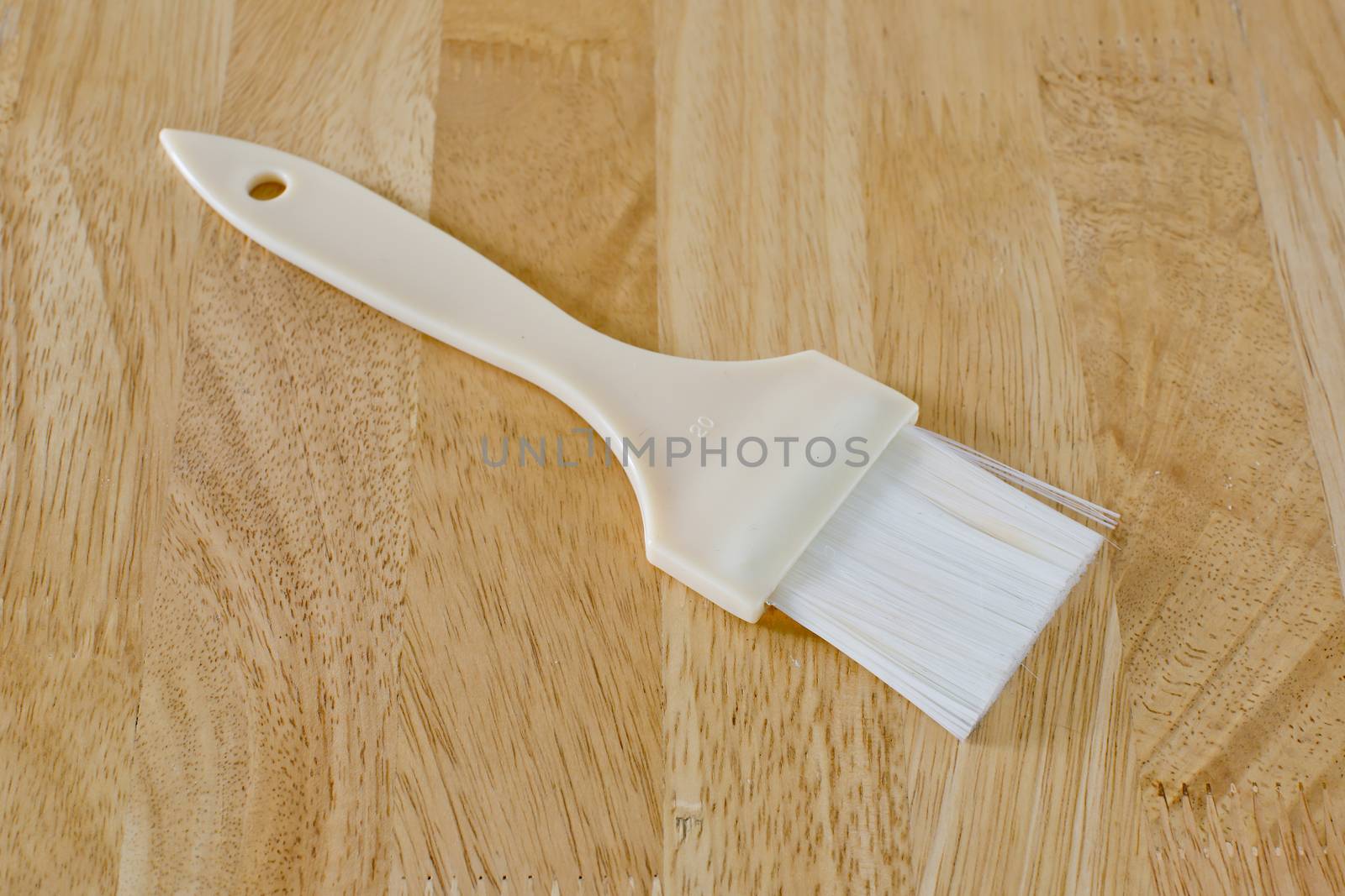 pastry brush baking utensils ona wood background