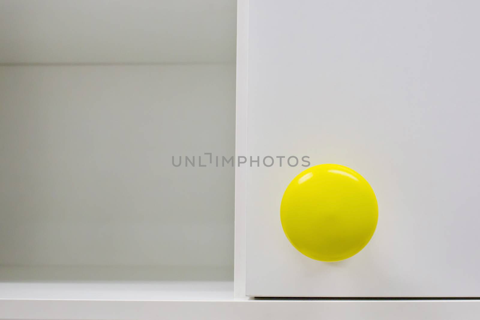 Cupboard handle with yellow color