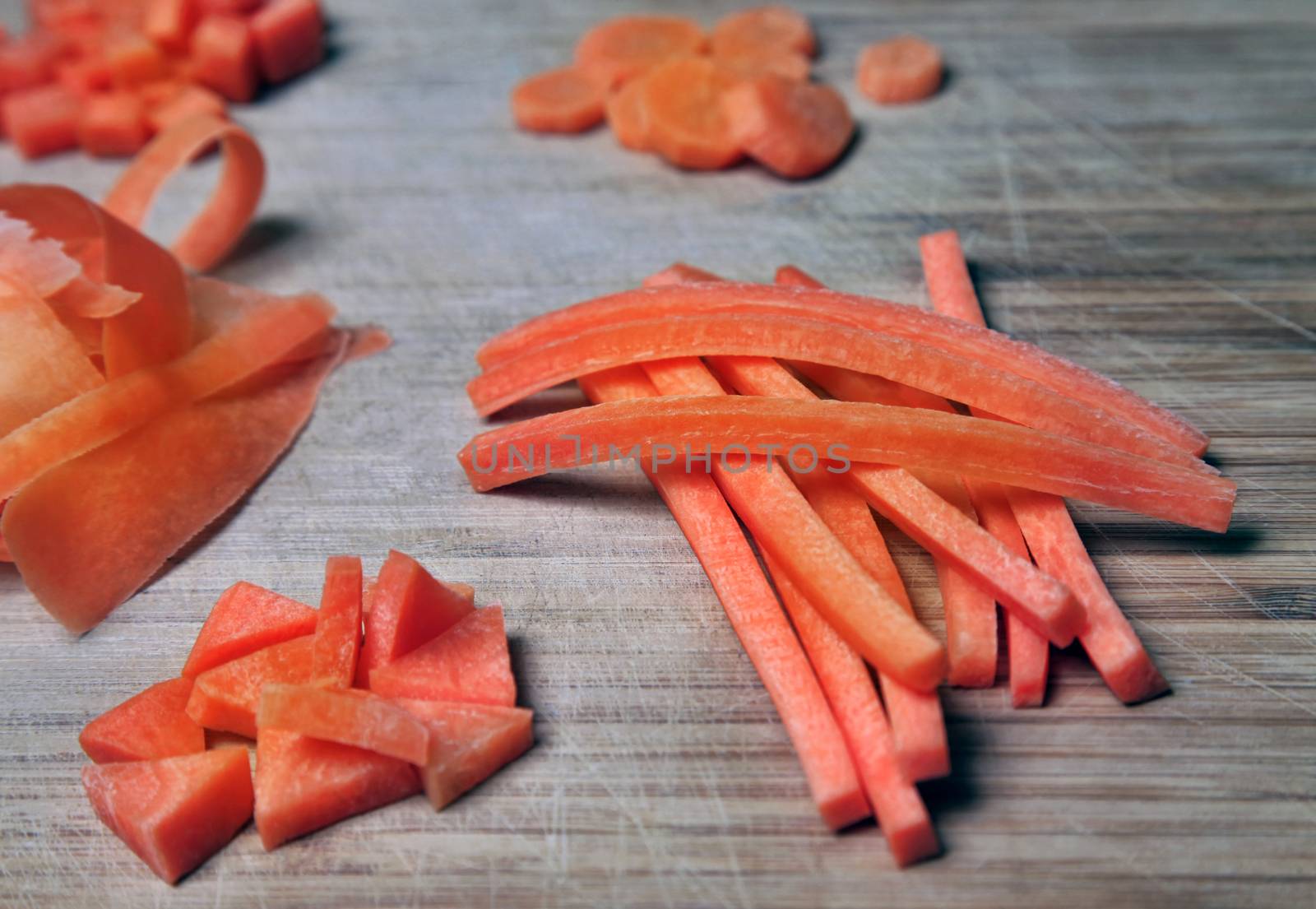 Sliced carrots on a wooden board