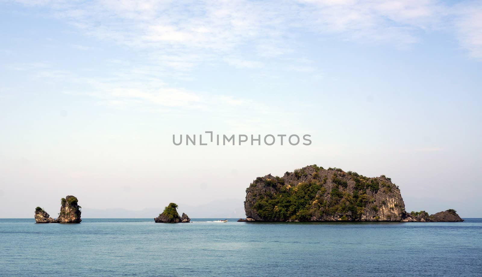 Beautiful beach with white sand, coast of Langkawi. by mcherevan