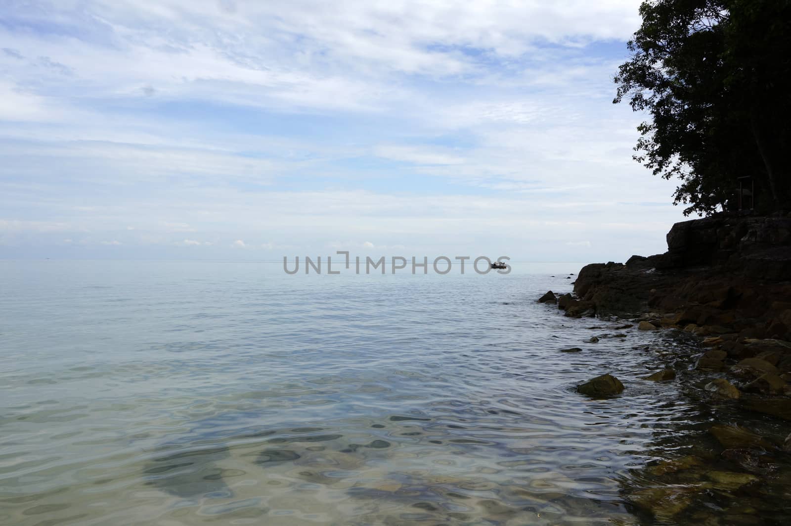 Beautiful beach with white sand, coast of Langkawi. by mcherevan