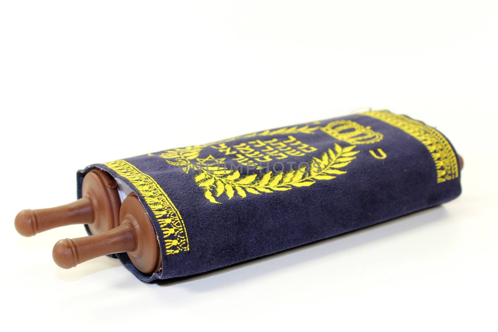a Torah scroll in front of white background