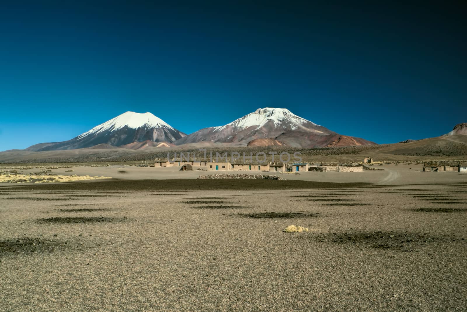 Scenic view of bolivian volcanoes,Pomerape and Paranicota in Sajama national park