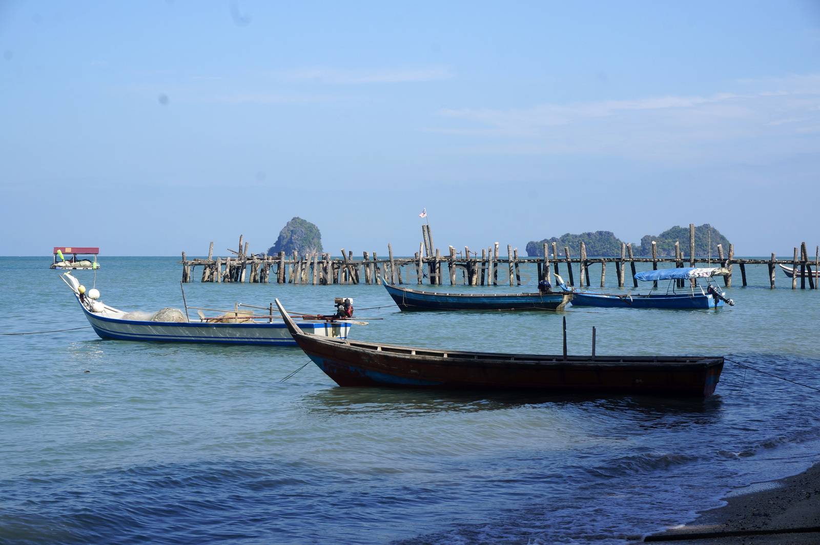 Old fishing boats are coast of Malaysia, Langkawi