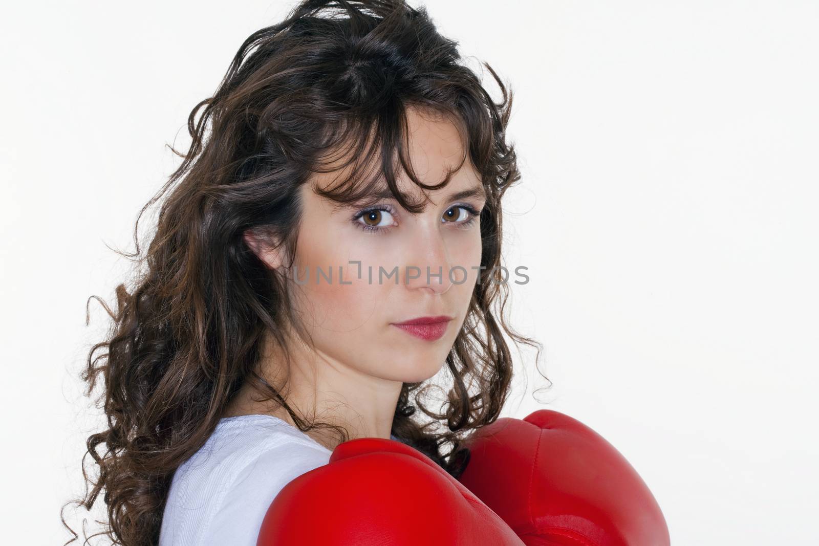young woman with boxing gloves by courtyardpix