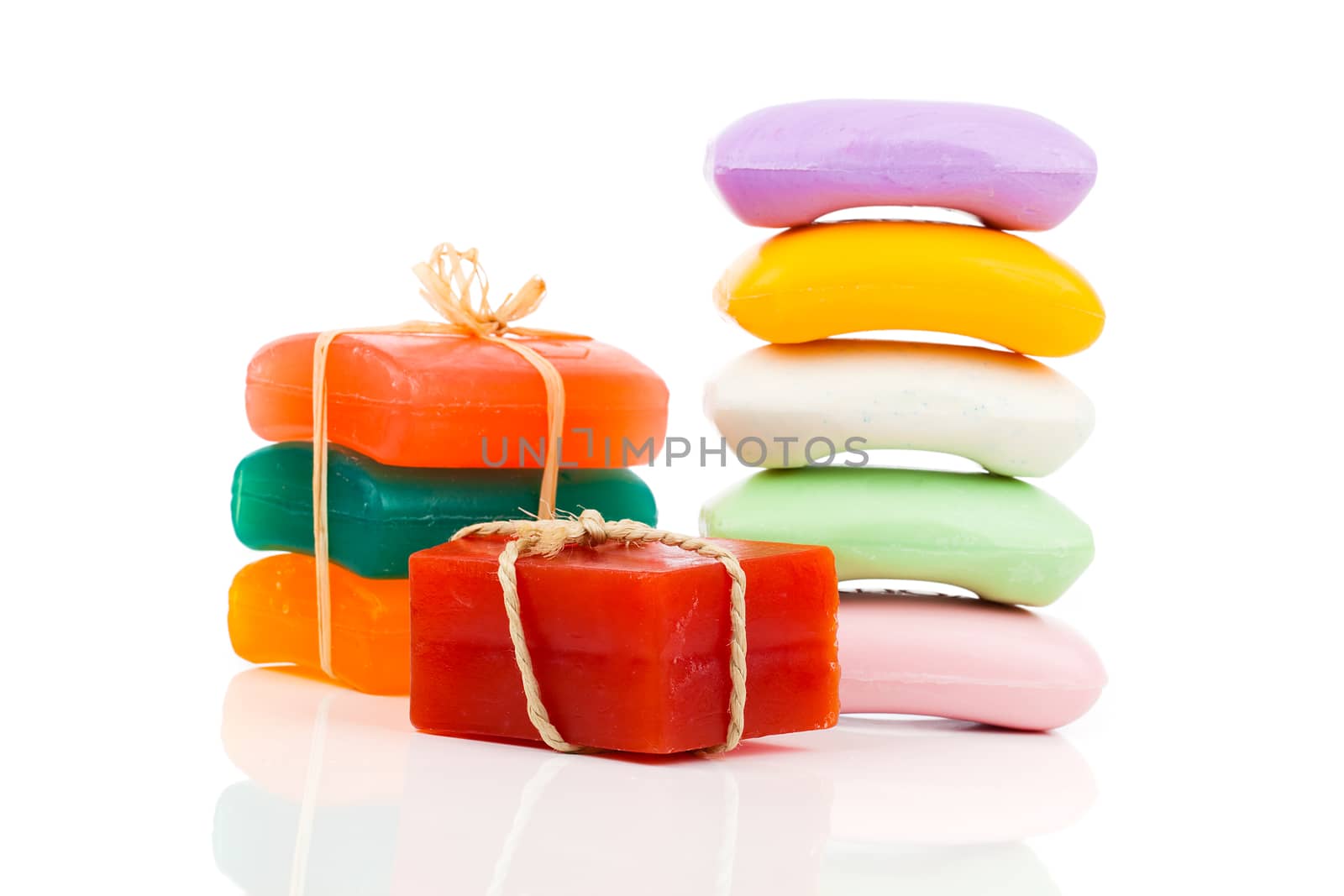 Stack of new colorful Soap Bars on white background. by motorolka